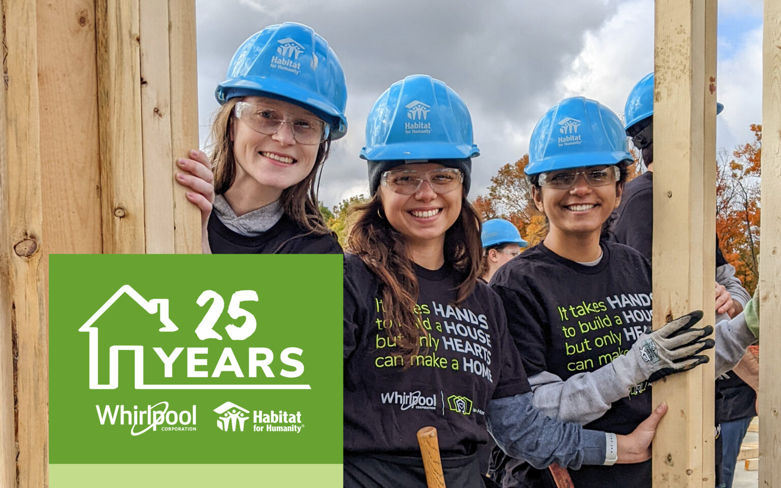 Habitat for Humanity and Whirlpool 25th Anniversary volunteers building a home
