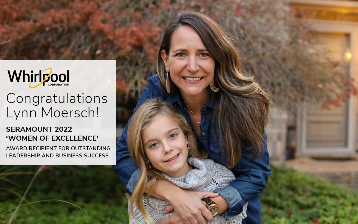 Whirlpool Corp employee Lynn Moersch, Seramount 2022 Award recipient smiling with her daughter in her front yard